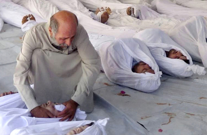 man-mourns-after-gas-attack.jpg